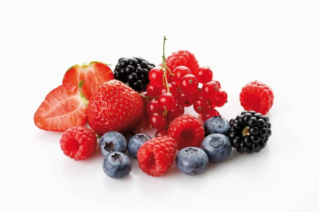 A variety of healthy foods on a table representing liver health.